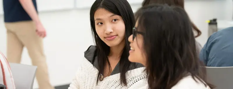 Students interacting in class