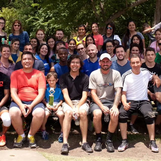 Past students at an outdoor gathering