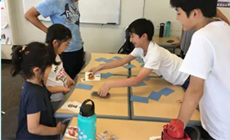A small-group table activity from a past children’s program