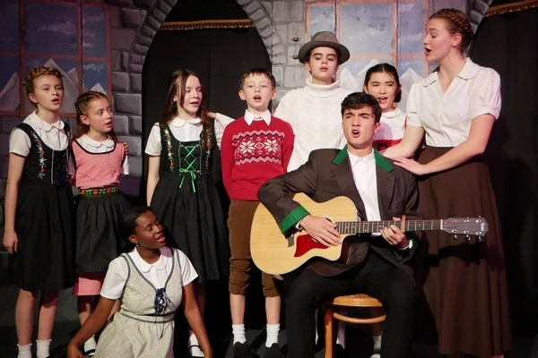 Students performing in a musical