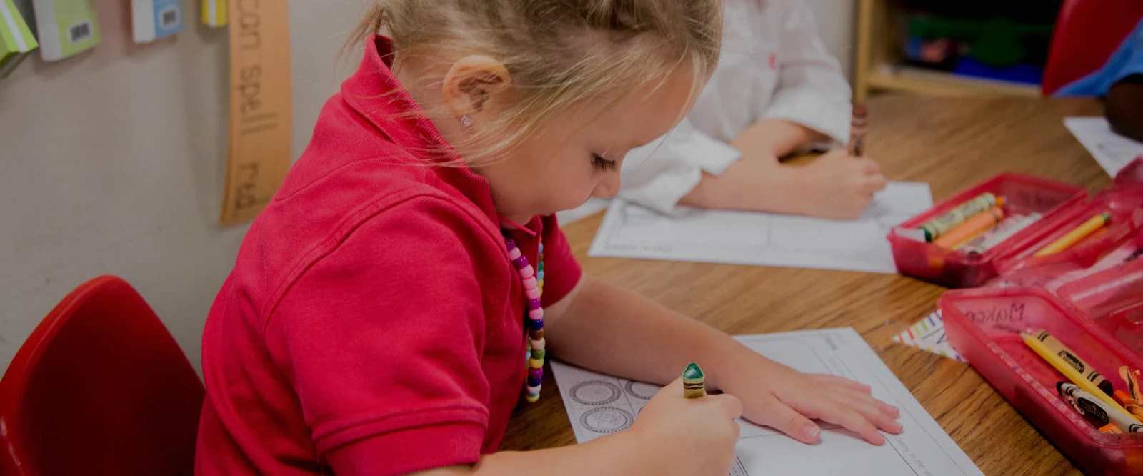 A student working on a classroom writing task