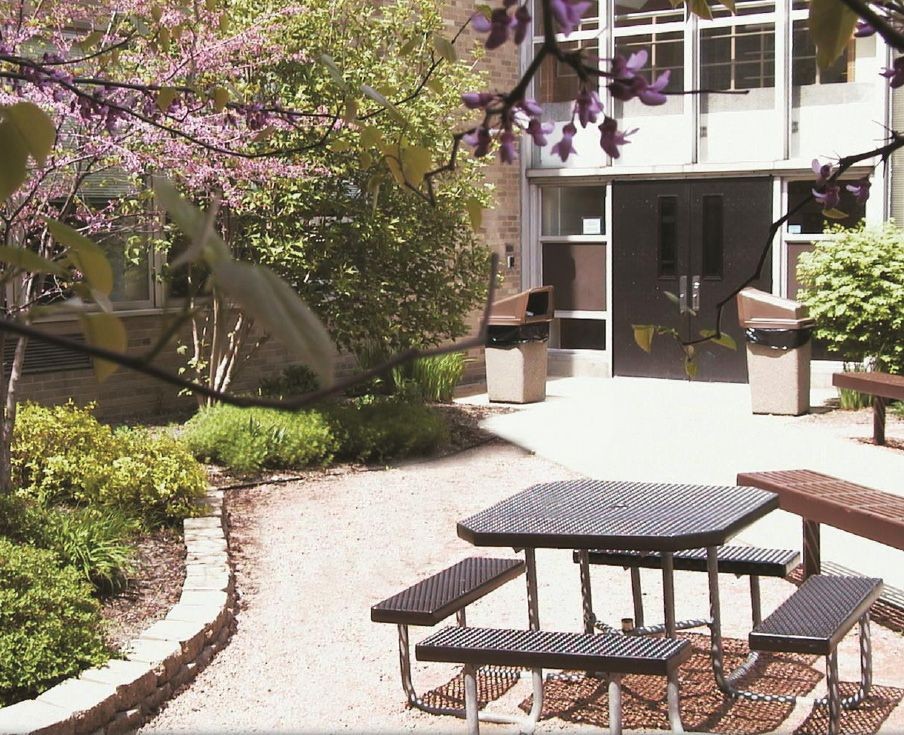 Courtyard seating beside school