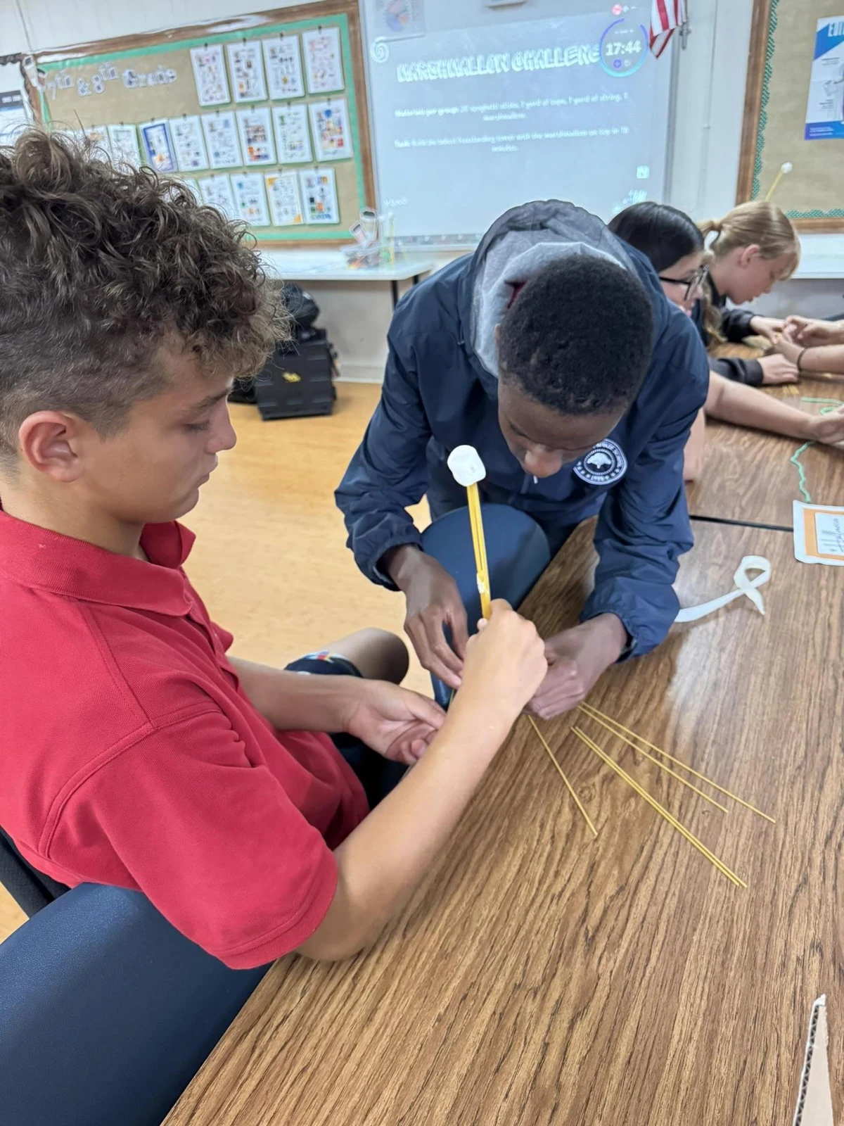 Students collaborate on a hands-on science project