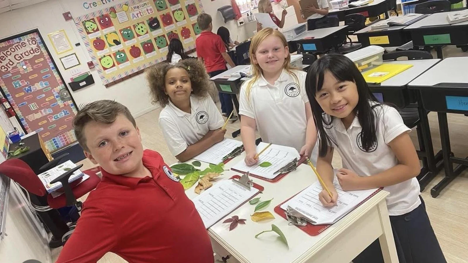 Students observe plant materials and record their findings