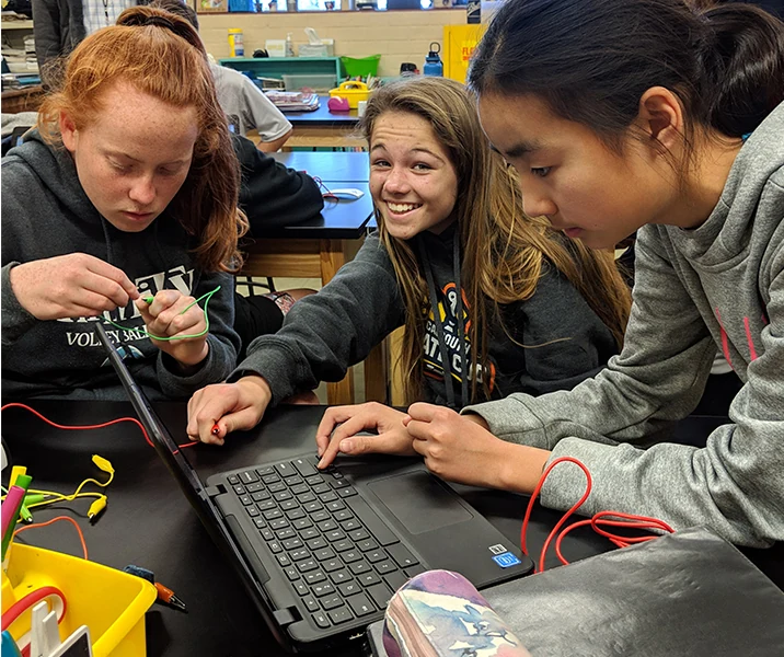 Students exploring circuits and computing together