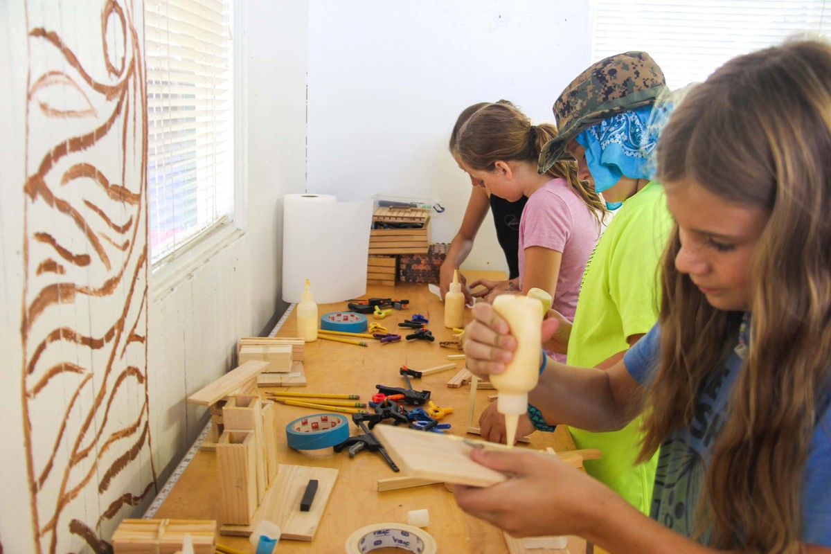 Past Camp Kinneret activity: working on a woodworking project