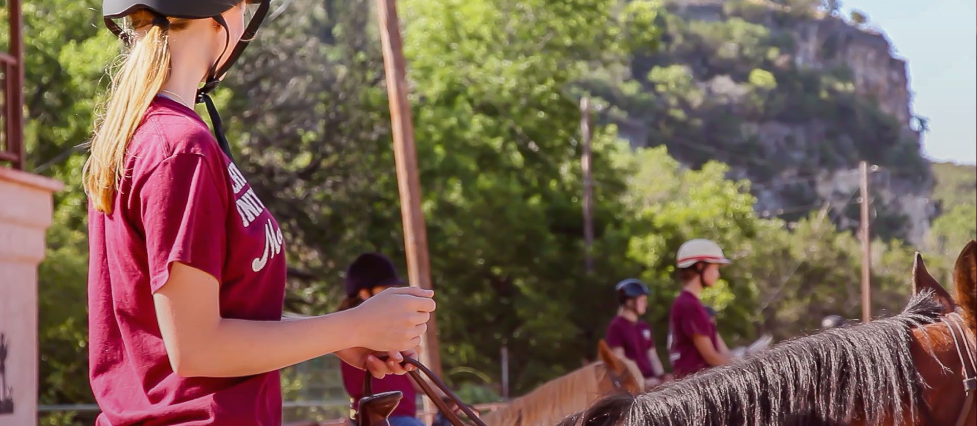 Schreiner University riders practicing horsemanship and polo at Camp Stewart.