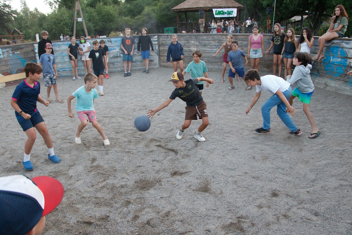 2026 sports activity: a group ball game on the sandy court