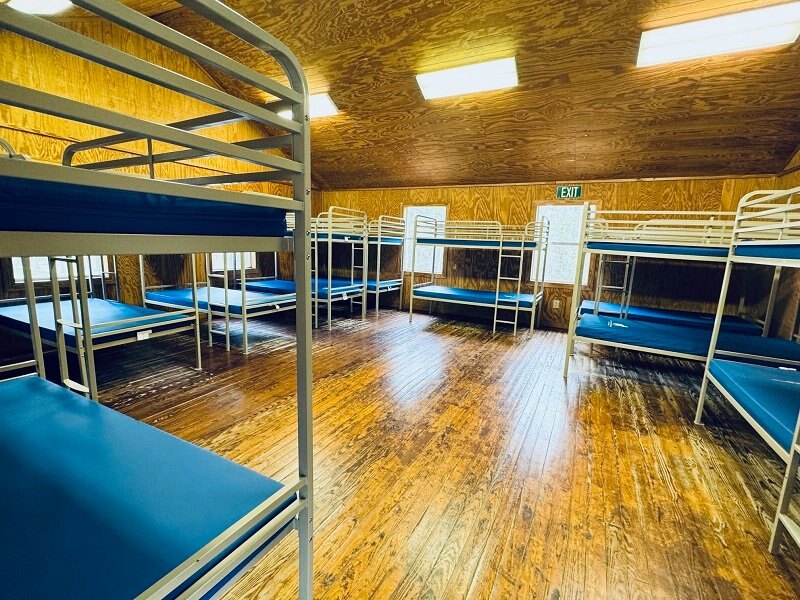 Past camp-tour view: an elementary-age cabin