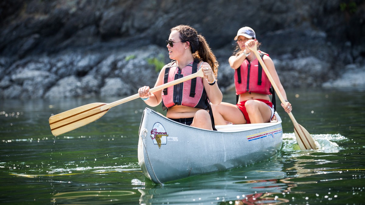 Past waterfront activity: paddling a canoe together