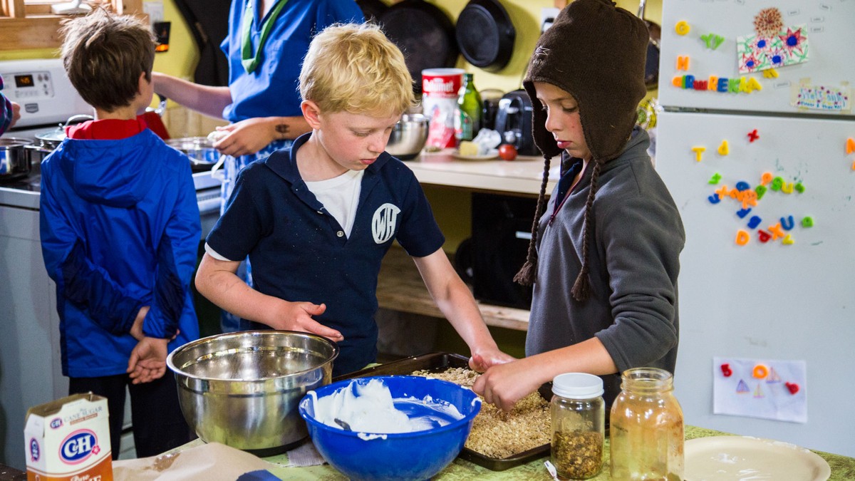 Past camp life: a group cooking activity