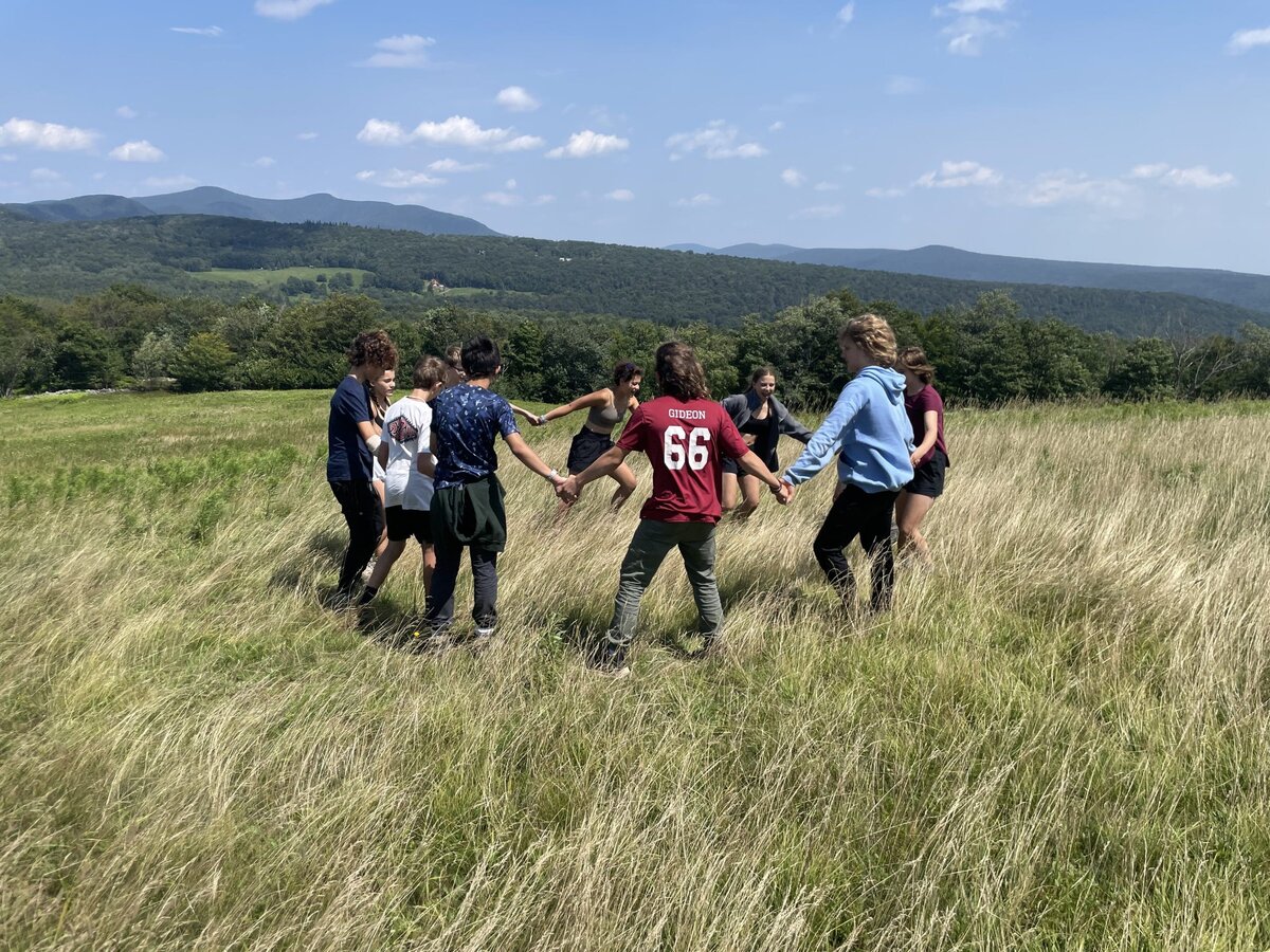 Past adventure program: a group activity in the meadow