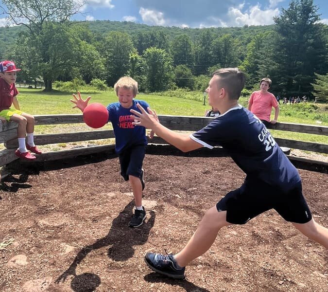 Past day camp: a group game of Ga-Ga ball