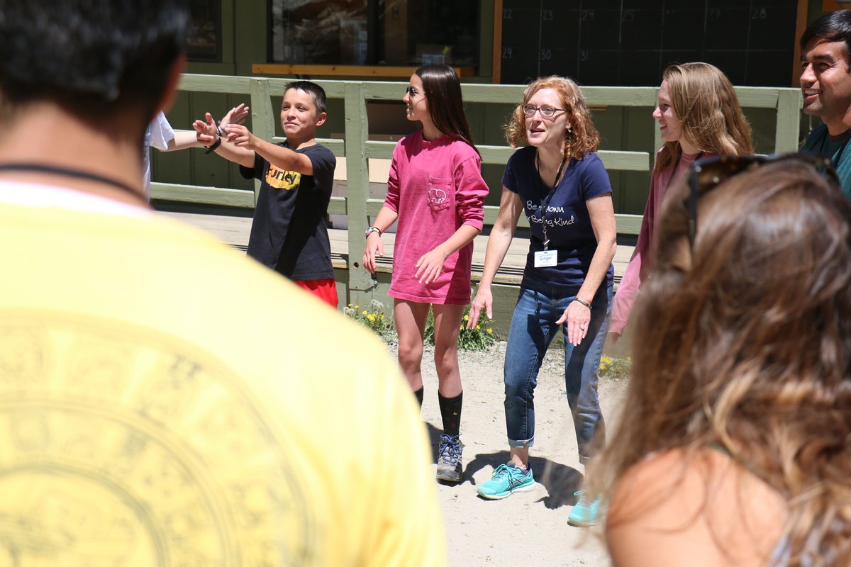 Gold Arrow Camp: a group game during staff training in 2019.