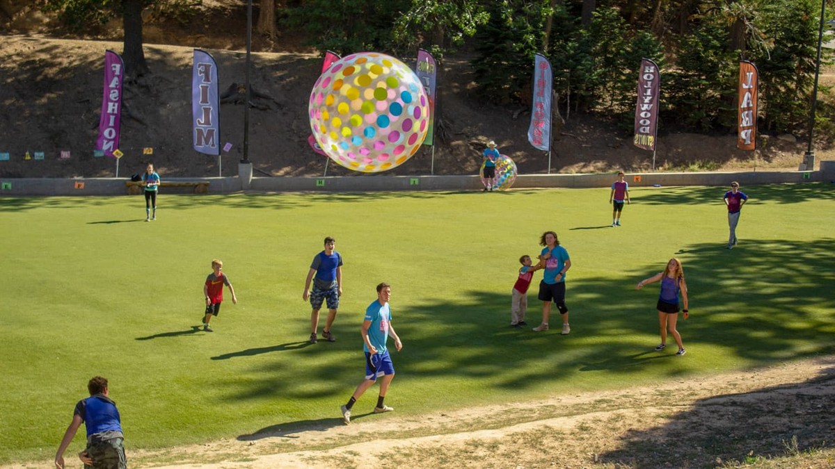 Past Pali activity: a giant inflatable-ball group game on the field