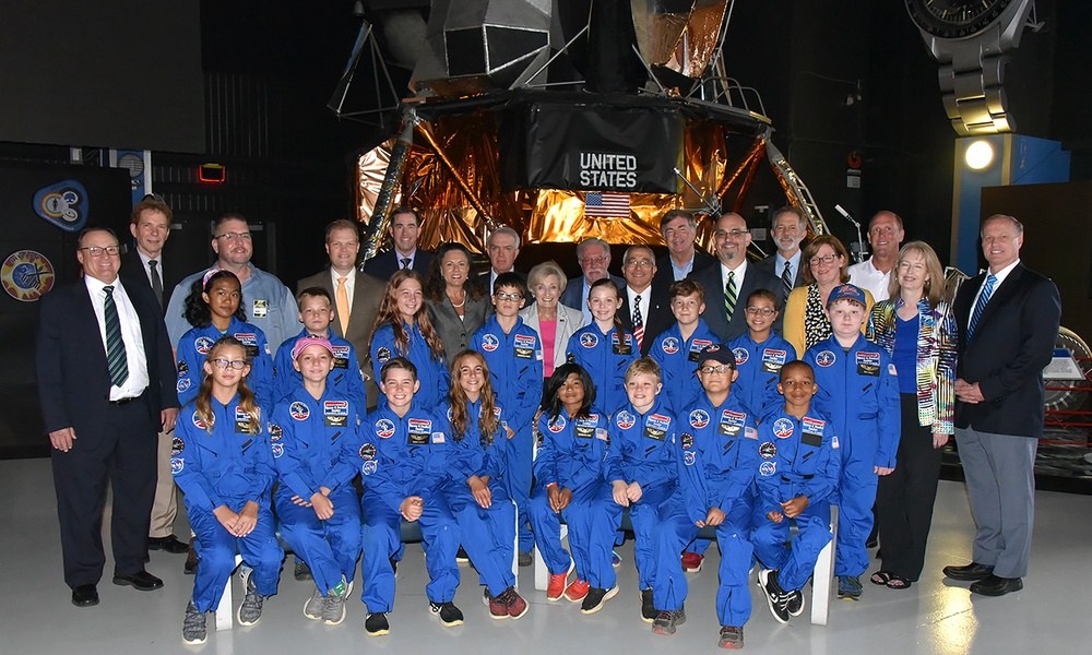 Space Camp scholarship participants and guests by the lunar module exhibit,2019.