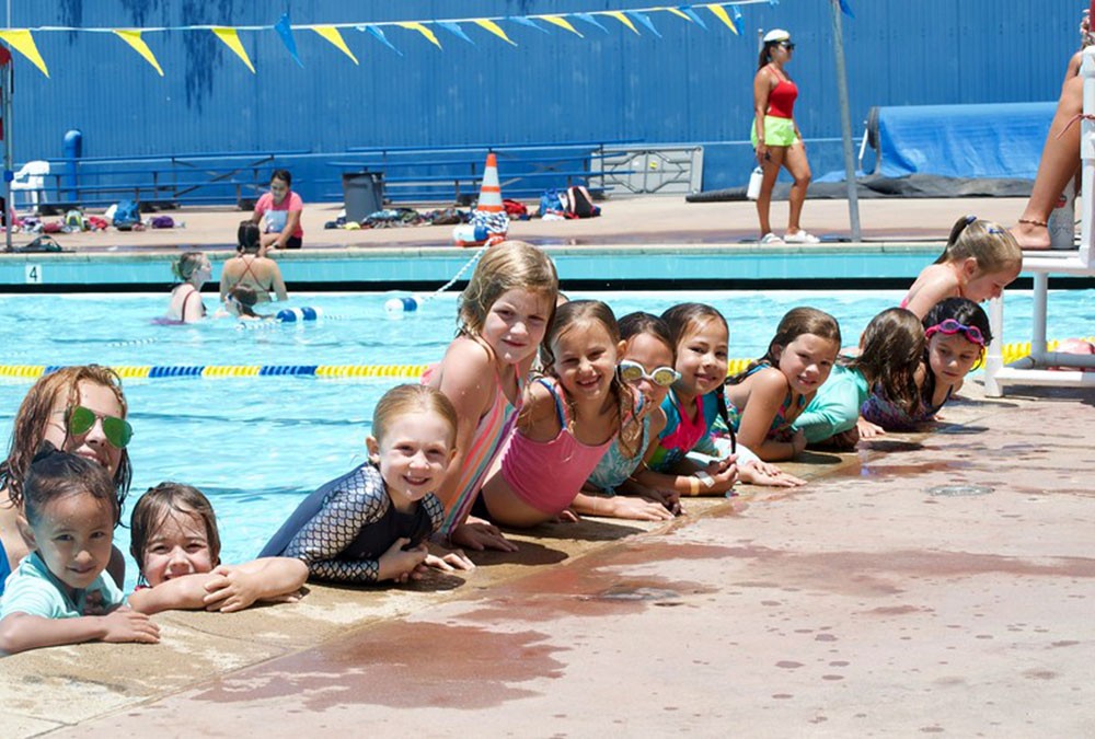 Past camp activity: group time at the swimming pool