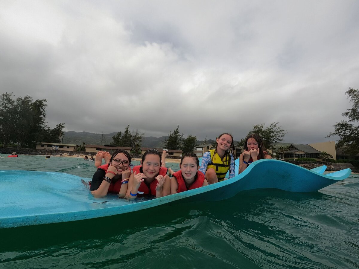 Group activity on a floating water mat