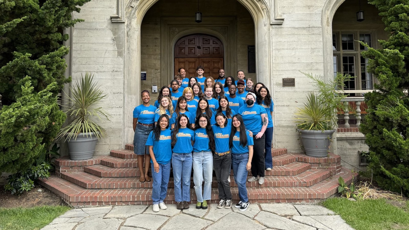 Pre-College students outside a campus building