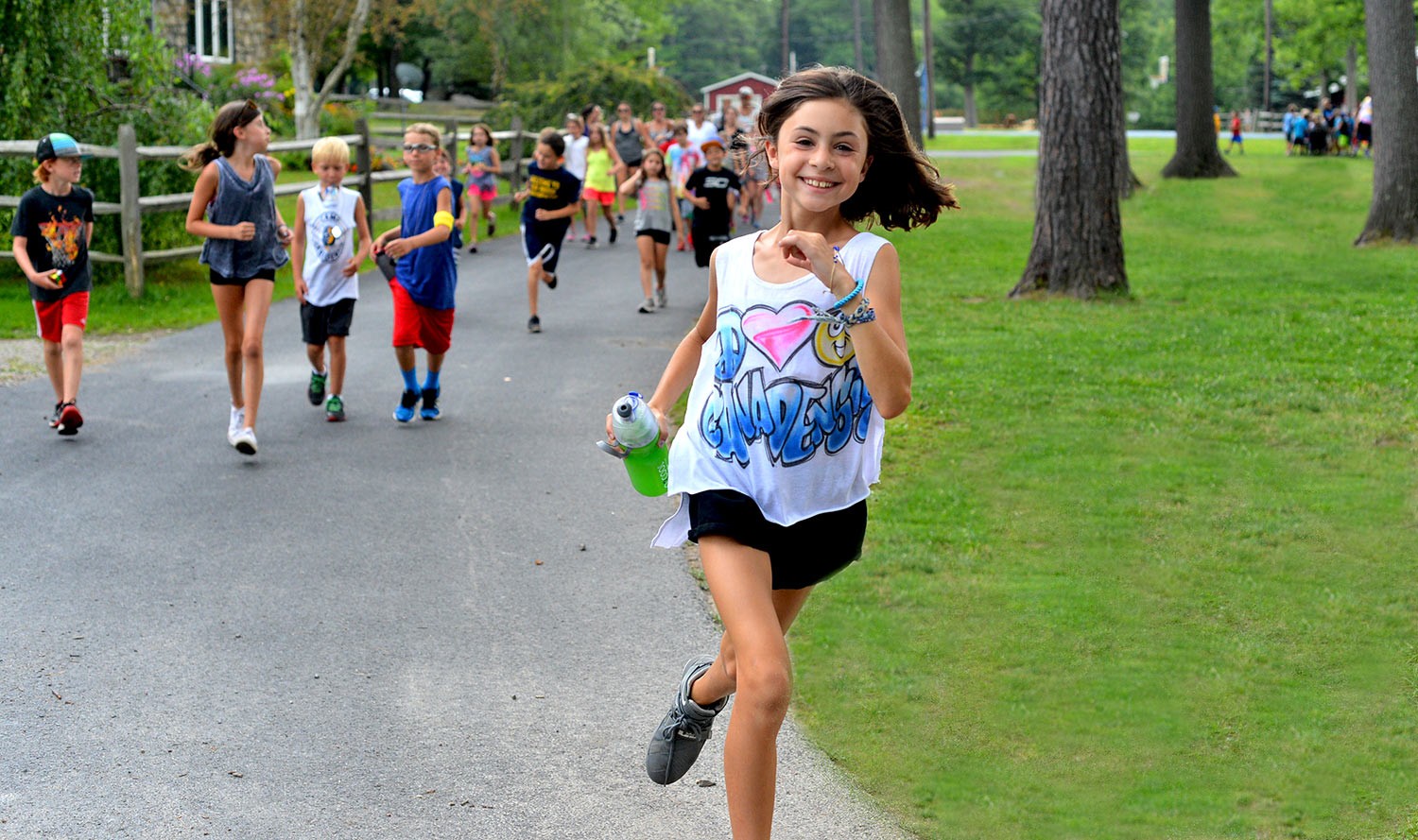 Campers taking part in an outdoor running activity