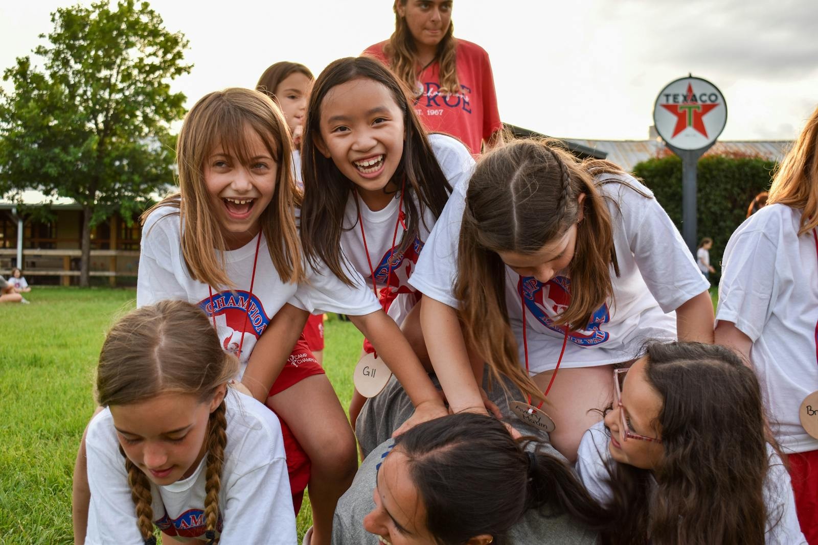 Campers laugh together outdoors