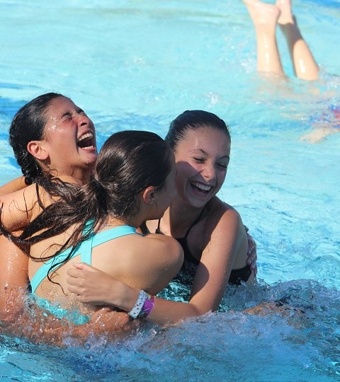 Campers playing in the swimming pool