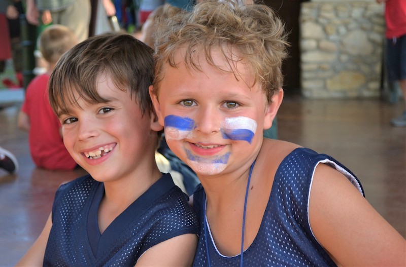 Two campers show their face paint