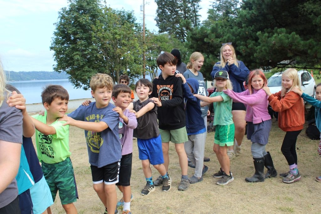 Campers taking part in an outdoor group game