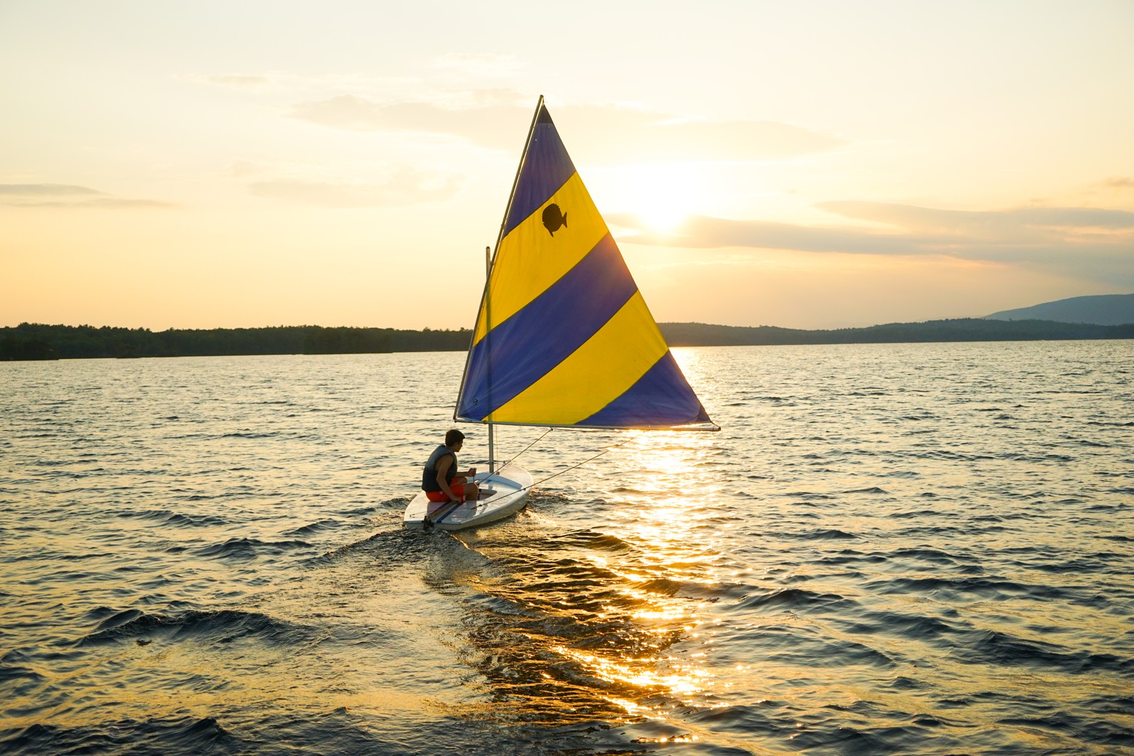 Sailing on the lake near sunset