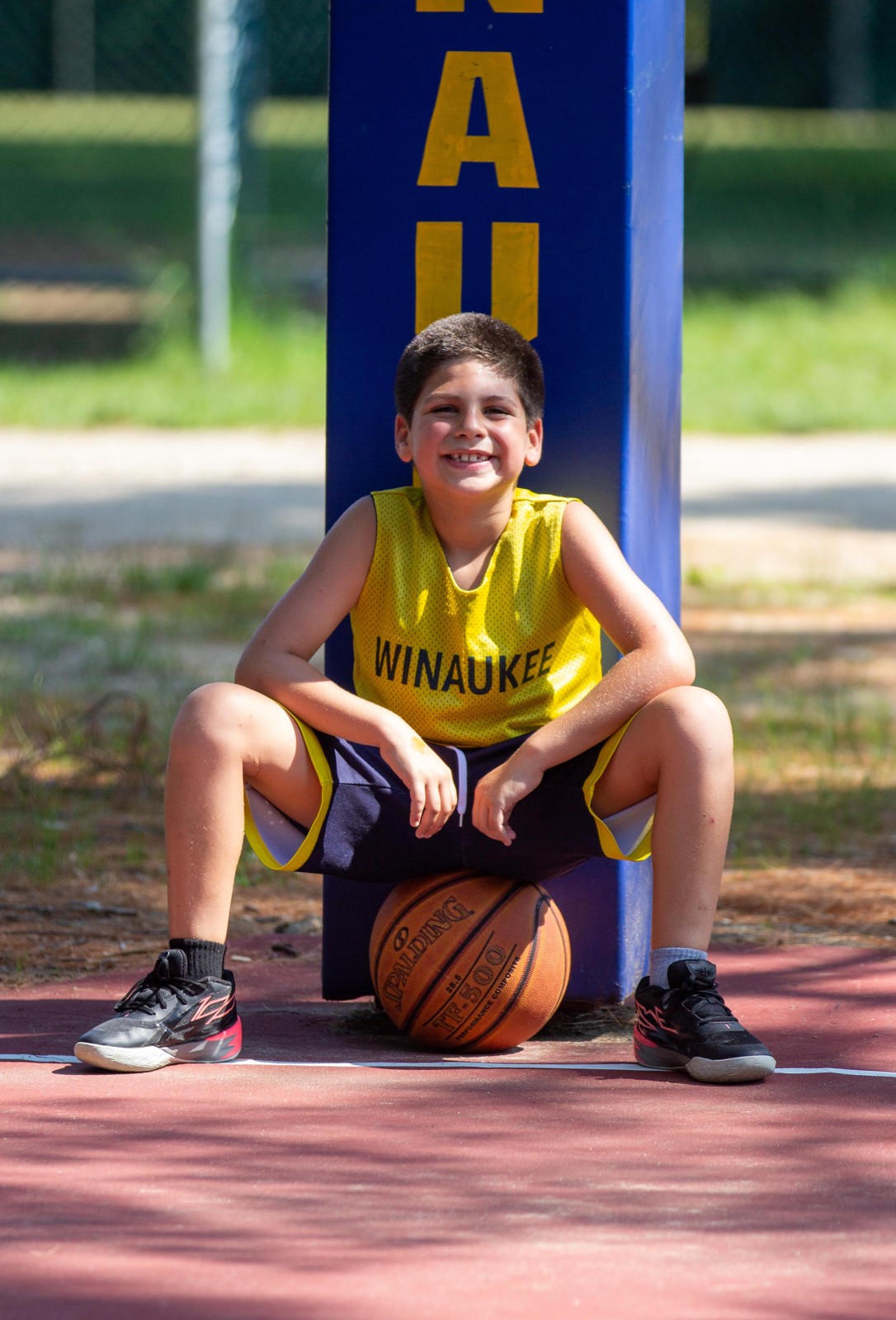 A camper on the basketball court