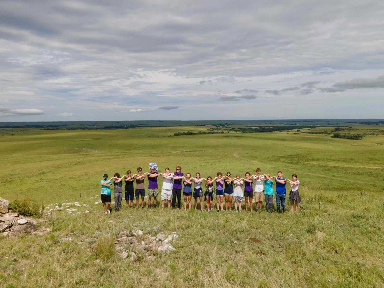 Camp Wood YMCA campers gather on the open prairie