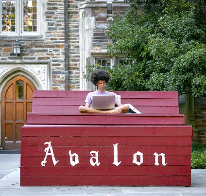 A student studying outdoors on Duke’s West Campus