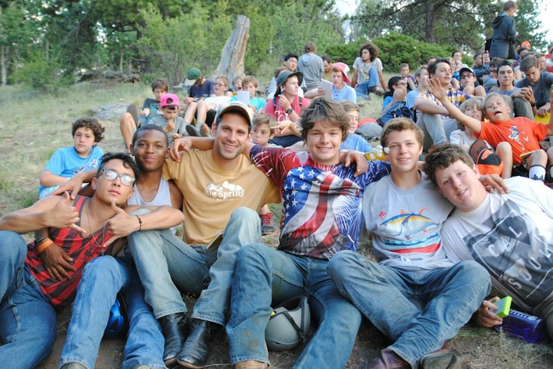 Campers gather for an outdoor group activity