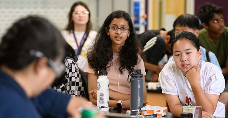 UW Youth & Teen students taking part in class discussion