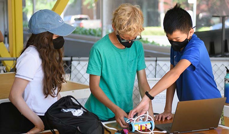 Youth & Teen students collaborating on a project