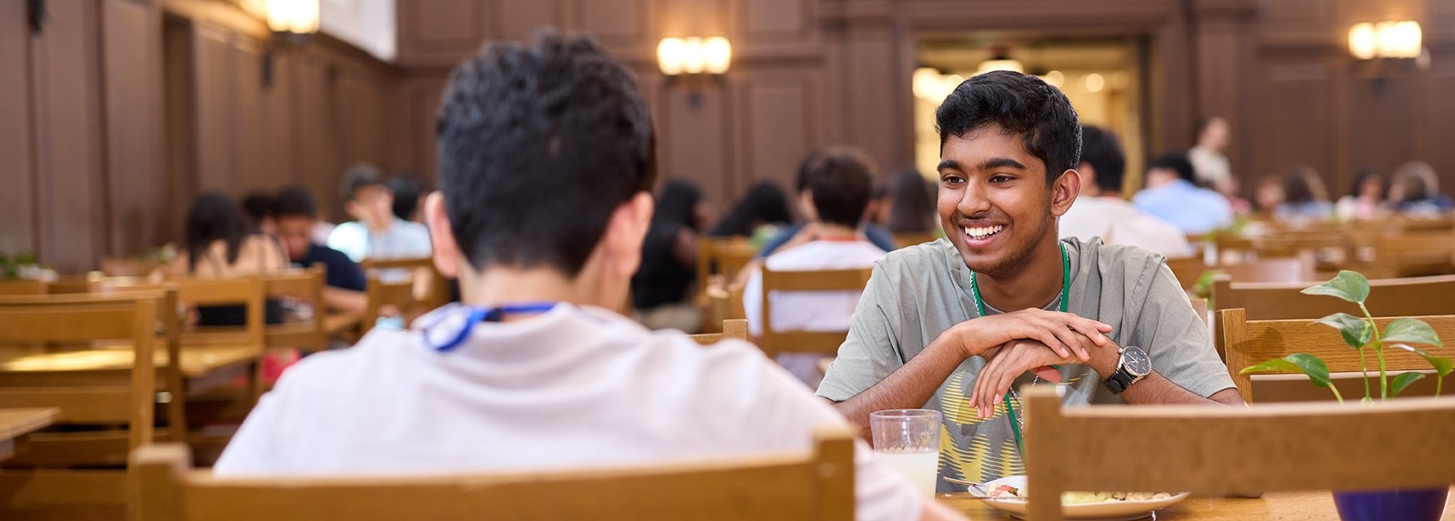Students talking in a Yale dining hall