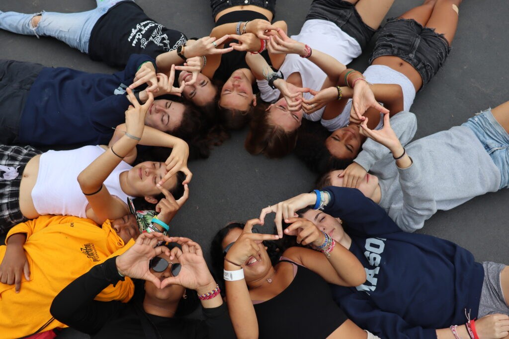 Campers posing together in a circle